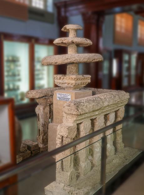 <h3>Railing Stupa</h3>  <p>The exhibit brings to the fore the original fragments of the stone railing, the triple umbrella (chattra) and harmika, from the Dharmarajika Stupa. The harmika represents the three jewels of Buddhism – the Buddha, the Dharma, and the Sangha.</p>