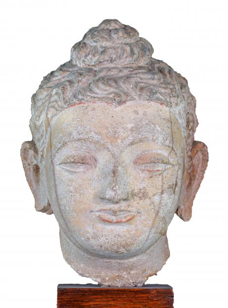 <h3>Buddha Head</h3> <p>Stucco<br /> 3rd – 5th century CE<br /> The stucco head, a typical portrayal of the Buddha in Gandharan art, is characterized by the ushnisha (protuberance at the top of the head representing spiritual power), the urna (a circular depression at the centre of forehead representing light and spiritual wisdom) and the expressive and contemplative quality of the facial features.</p>